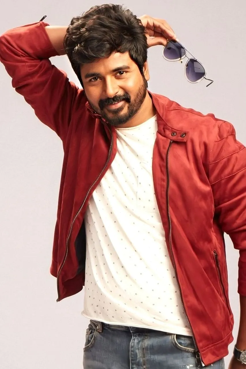 Sivakarthikeyan Casual Look with Red Jacket and Sunglasses