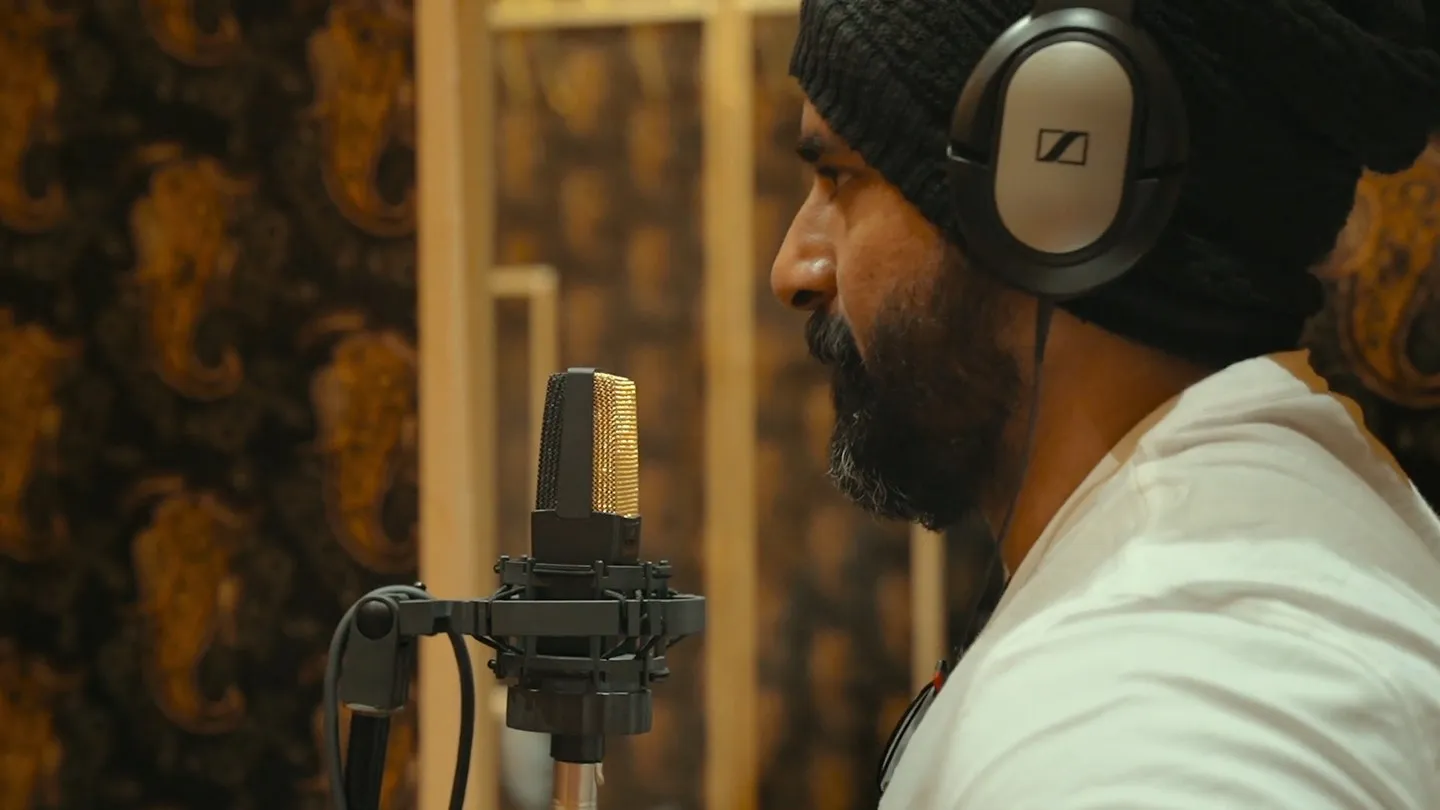 Sivakarthikeyan Engaged in Recording Session with Headphones