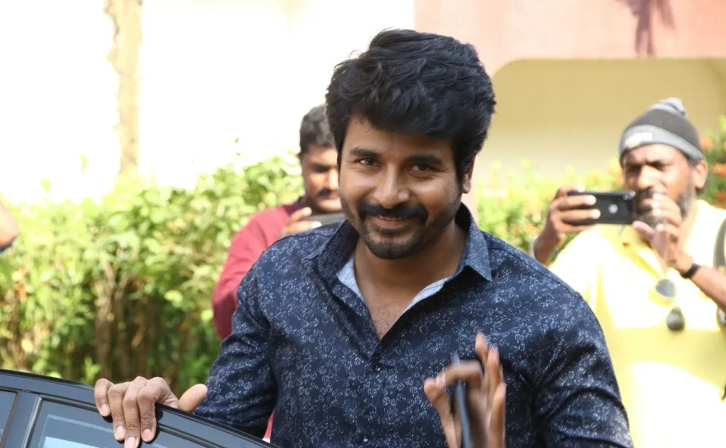 Sivakarthikeyan Giving a Cheerful Pose with Happy Smile