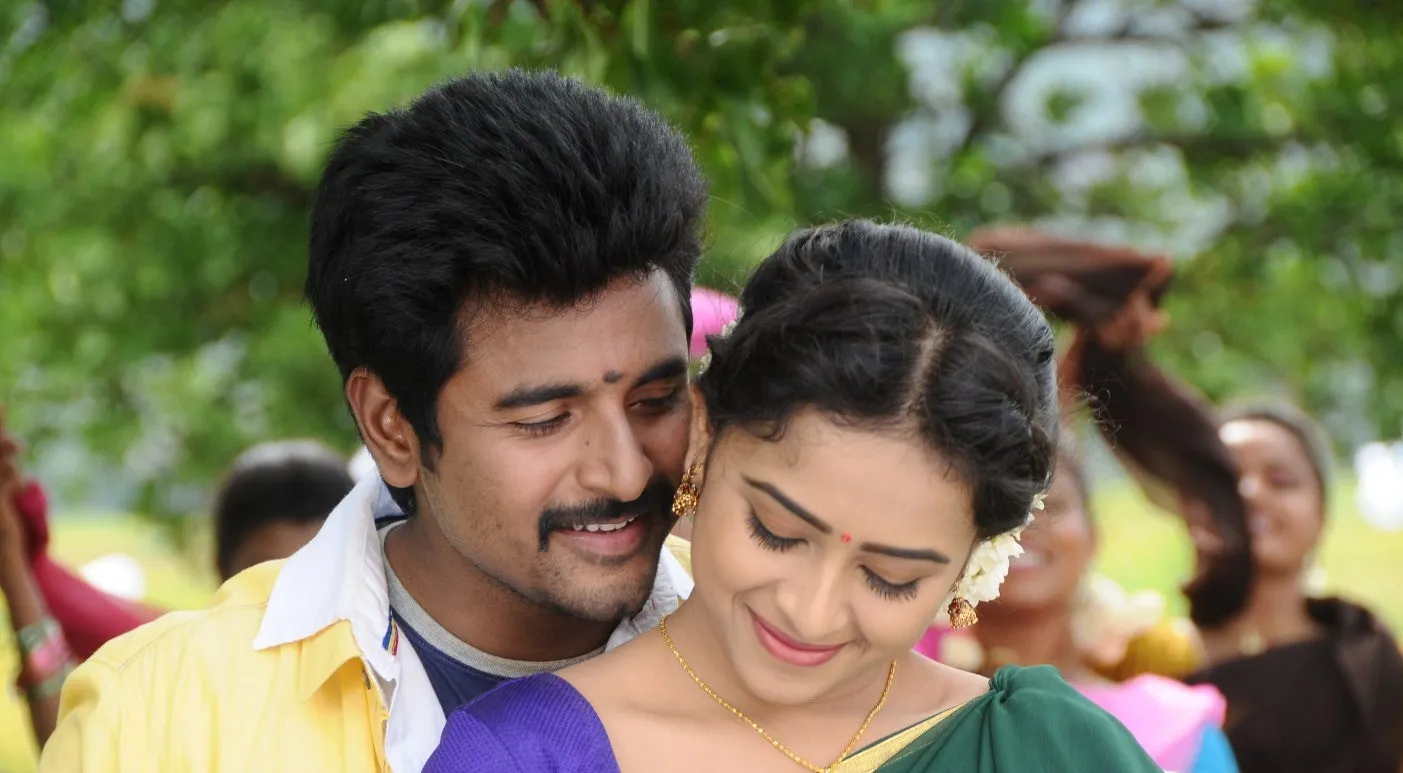 Sivakarthikeyan Hugging Sri Divya from Kaaki Sattai Wallpaper