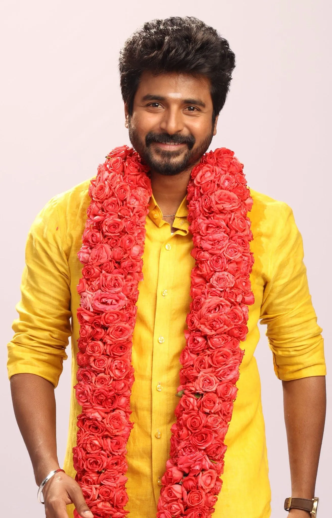 Sivakarthikeyan in a Yellow Shirt with a Rose Garland Image