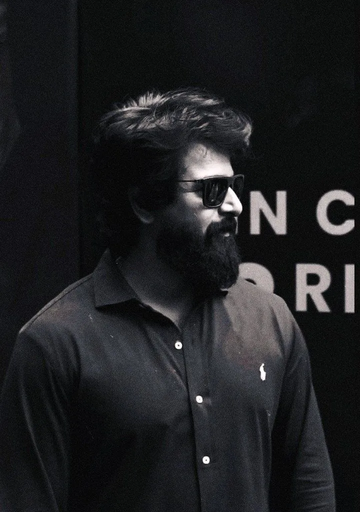 Sivakarthikeyan in Black Shirt with Side Profile Wallpaper