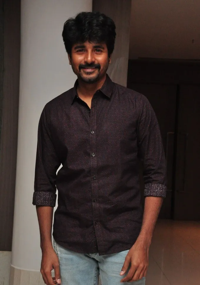 Sivakarthikeyan in Dark Shirt Posing Casually HD Wallpaper