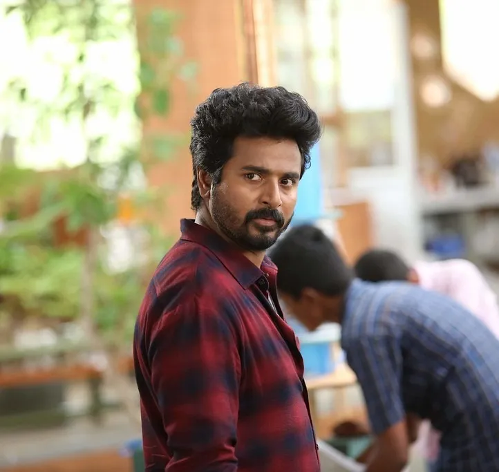 Sivakarthikeyan in Red Checked Shirt Looking Sideways Image