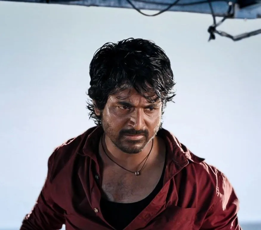 Sivakarthikeyan in Red Shirt with An Angry Expression Image