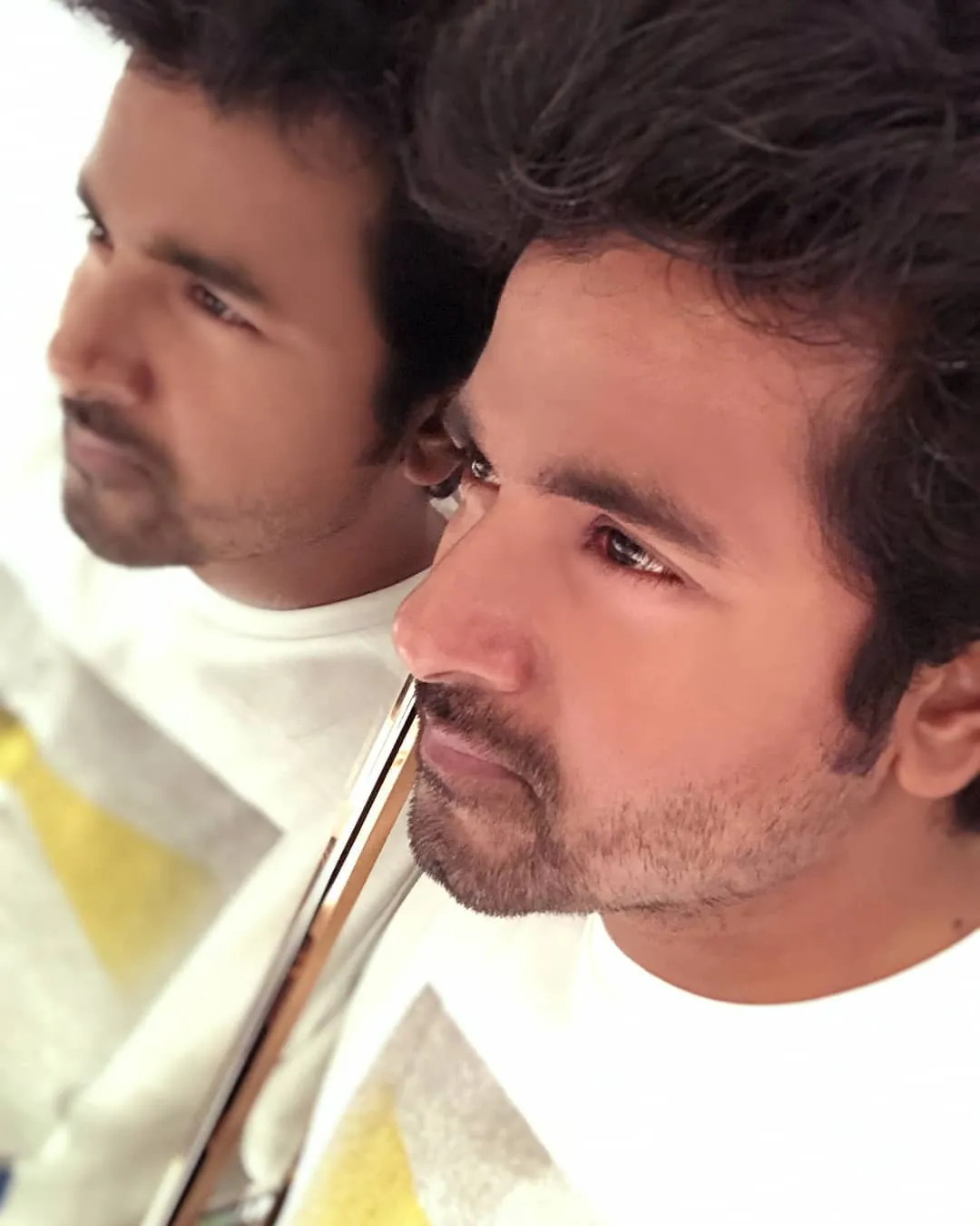 Sivakarthikeyan in Stylish White Tshirt Closeup Wallpaper