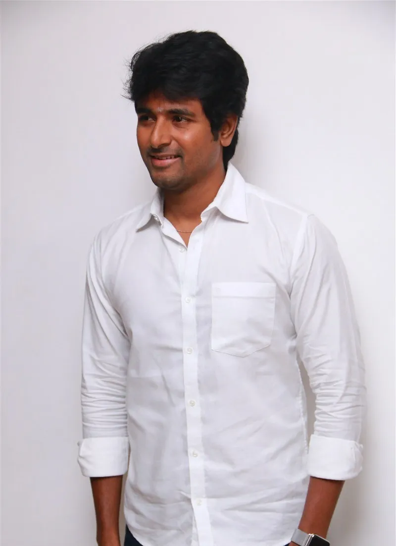 Sivakarthikeyan in White Shirt Against a White Background