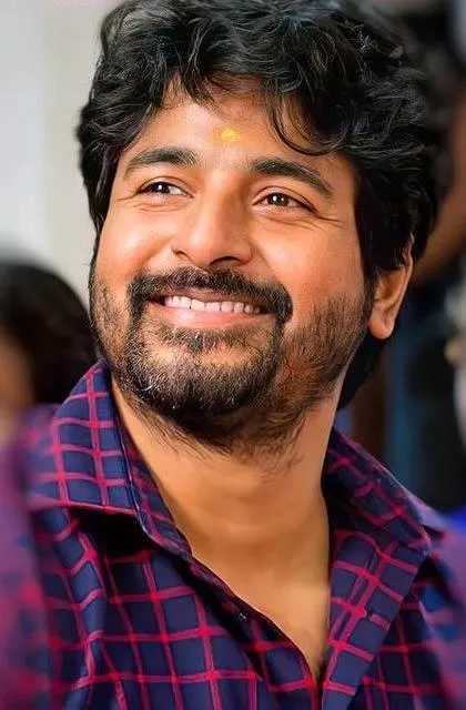 Sivakarthikeyan Laughing in Red and Blue Checkered Shirt