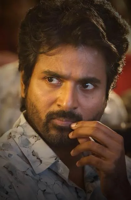 Sivakarthikeyan Looking Serious with Hand on Chin Image