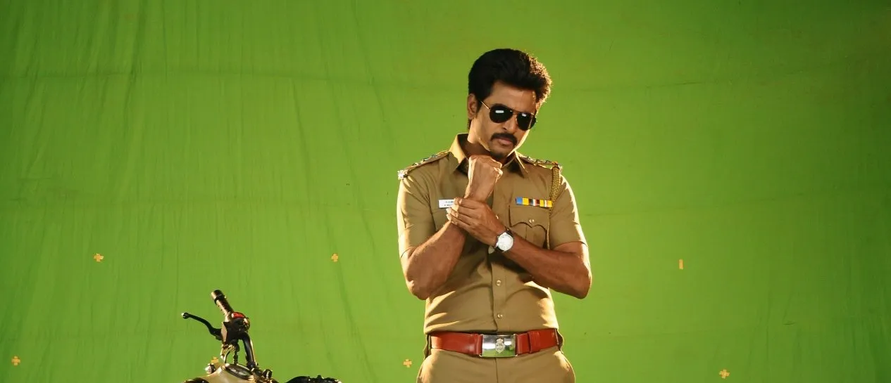 Sivakarthikeyan Posing Confidently in Police Uniform Image