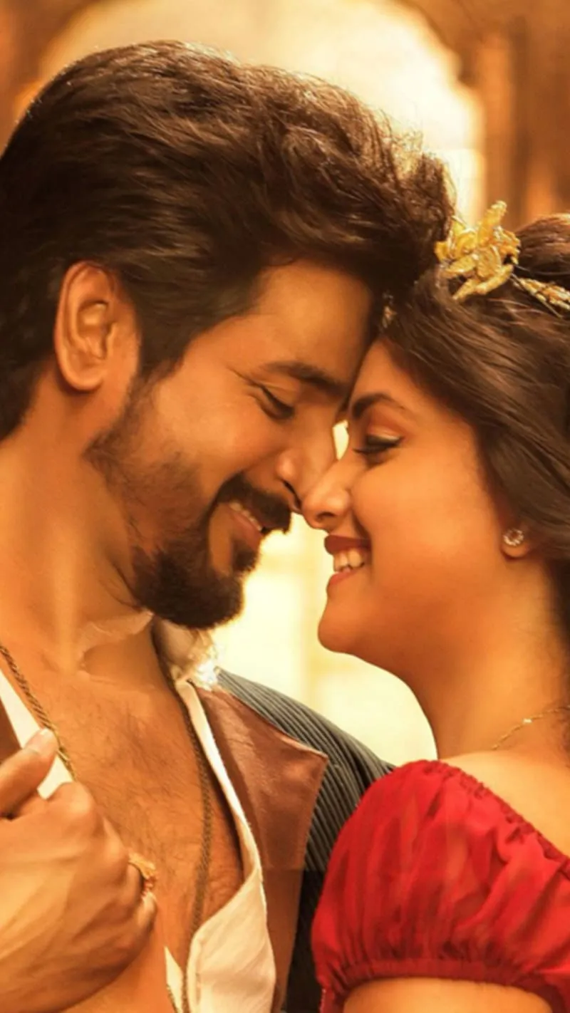 Sivakarthikeyan Romantic Moment in Warm Lighting Wallpaper