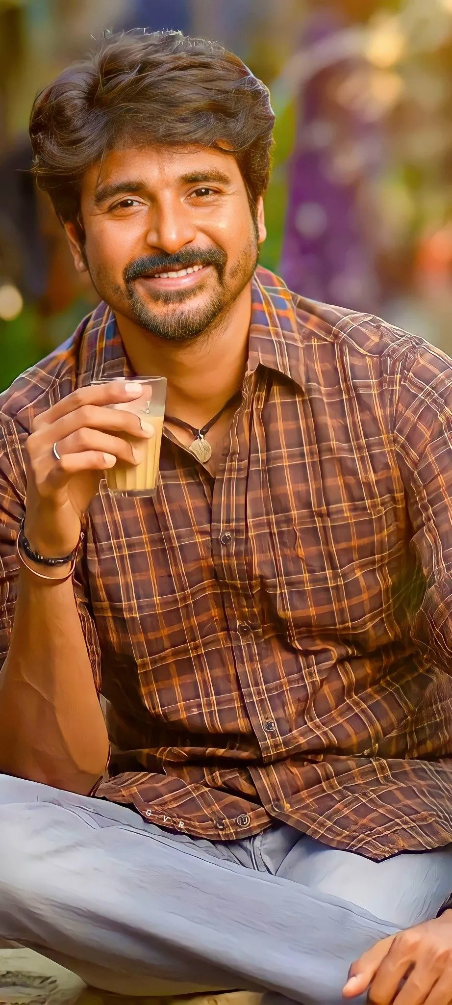 Sivakarthikeyan Sitting Outside and Holding a Cup of Tea