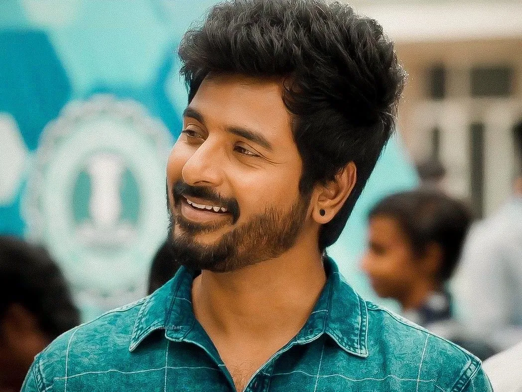 Sivakarthikeyan Smiling in Green Shirt a Still from Don