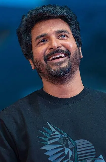 Sivakarthikeyan Smiling Upwards in Dark Blue Graphic T Shirt