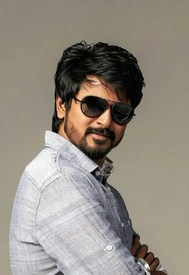 Sivakarthikeyan Standing Sideways and Looking At the Camera