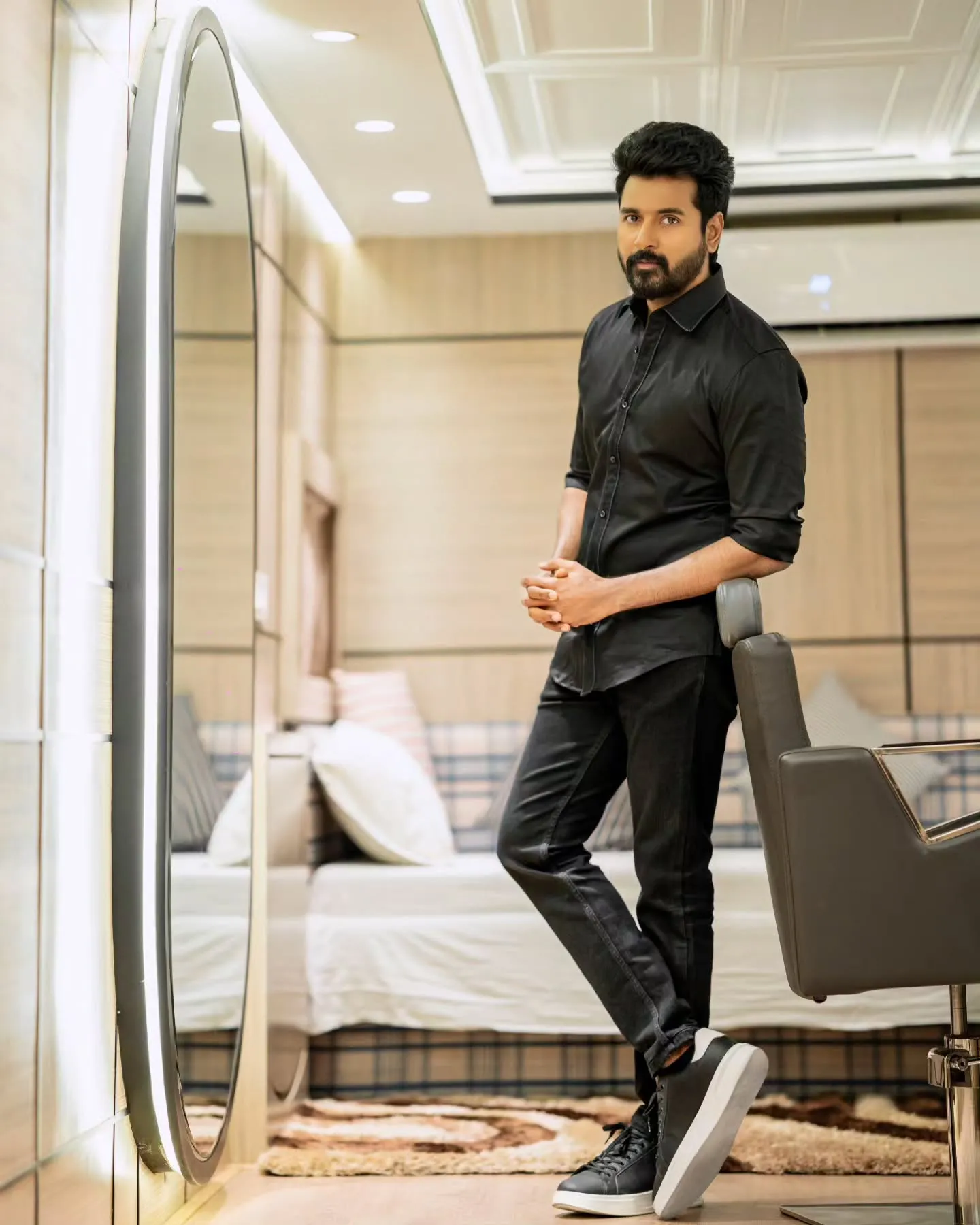 Sivakarthikeyan Stylish in Black Outfit Indoors Wallpaper