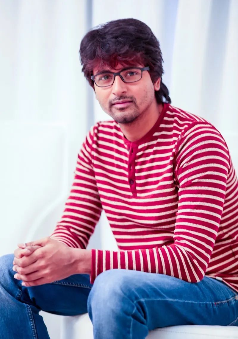 Sivakarthikeyan Wearing a Pink with White Line T Shirt Image