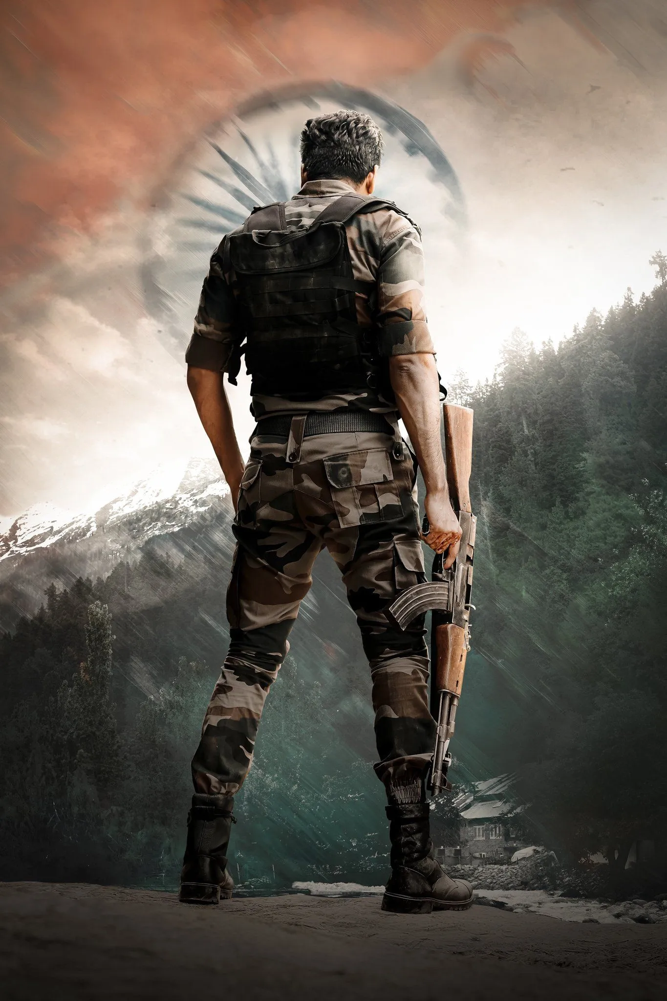 Sivakarthikeyan with Rifle Standing Strong in Mountain Scene