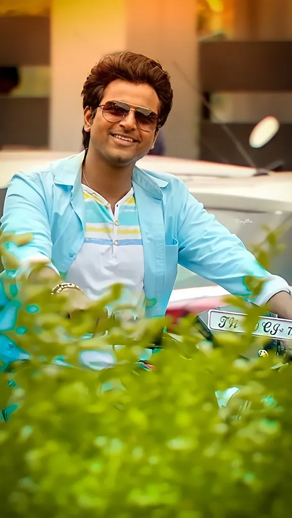 Sivakarthikeyann Driving a Bike a Scene from Remo Movie