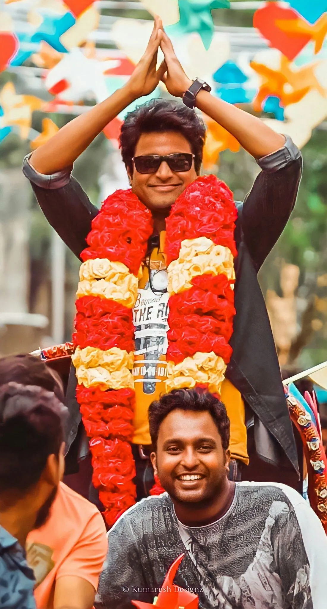 Sivakrthikeyan in Garland and Sunglasses with Vannakam Pose