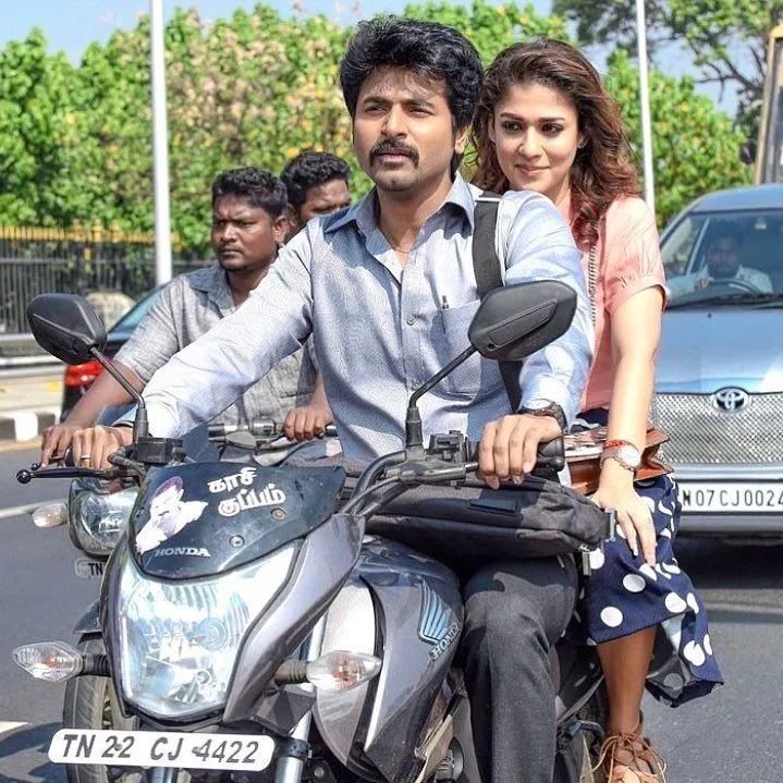 Sk and Nayanthara on a Motorcycle from Vellaikaran Wallpaper