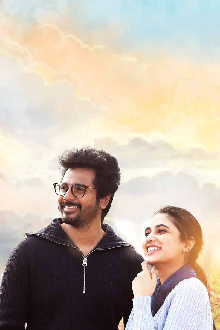 Sk and Priyanka Mohan Smiling Under a Sunset Sky Wallpaper