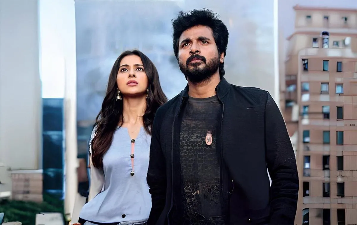 Sk and Rakul Preet Singh on Rooftop with City in Background