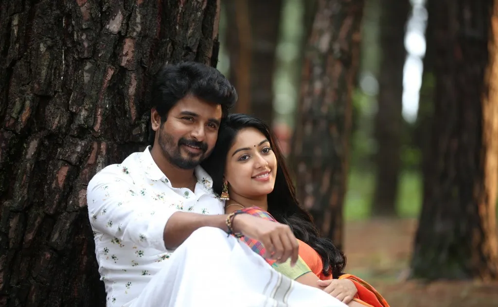 Sk Comforting Anu Emmanuel in Forest Romantic Scene Image