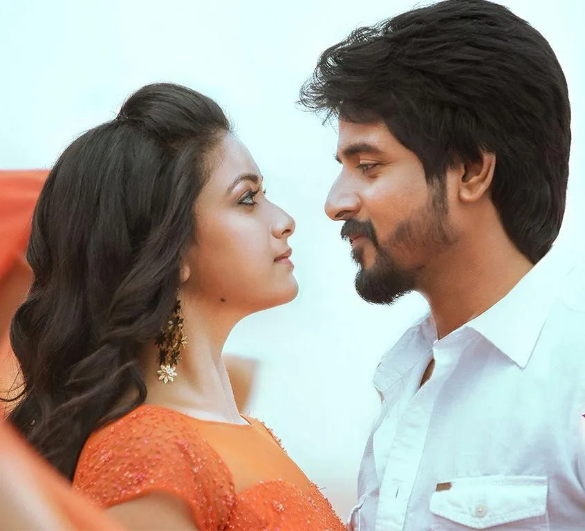 Sk Romantic Gaze with Keerthi Suresh in Orange Gown Still