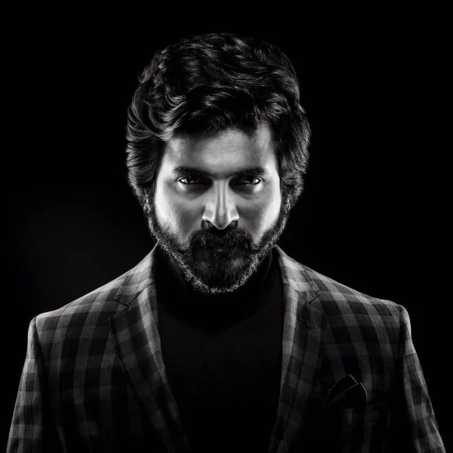 Stunning Wallpaper of Sivakarthikeyan with Black Background