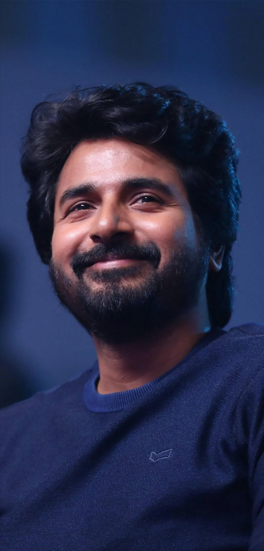 Wallpaper of Sivakarthikeyan in a Dark Blue T Shirt HD