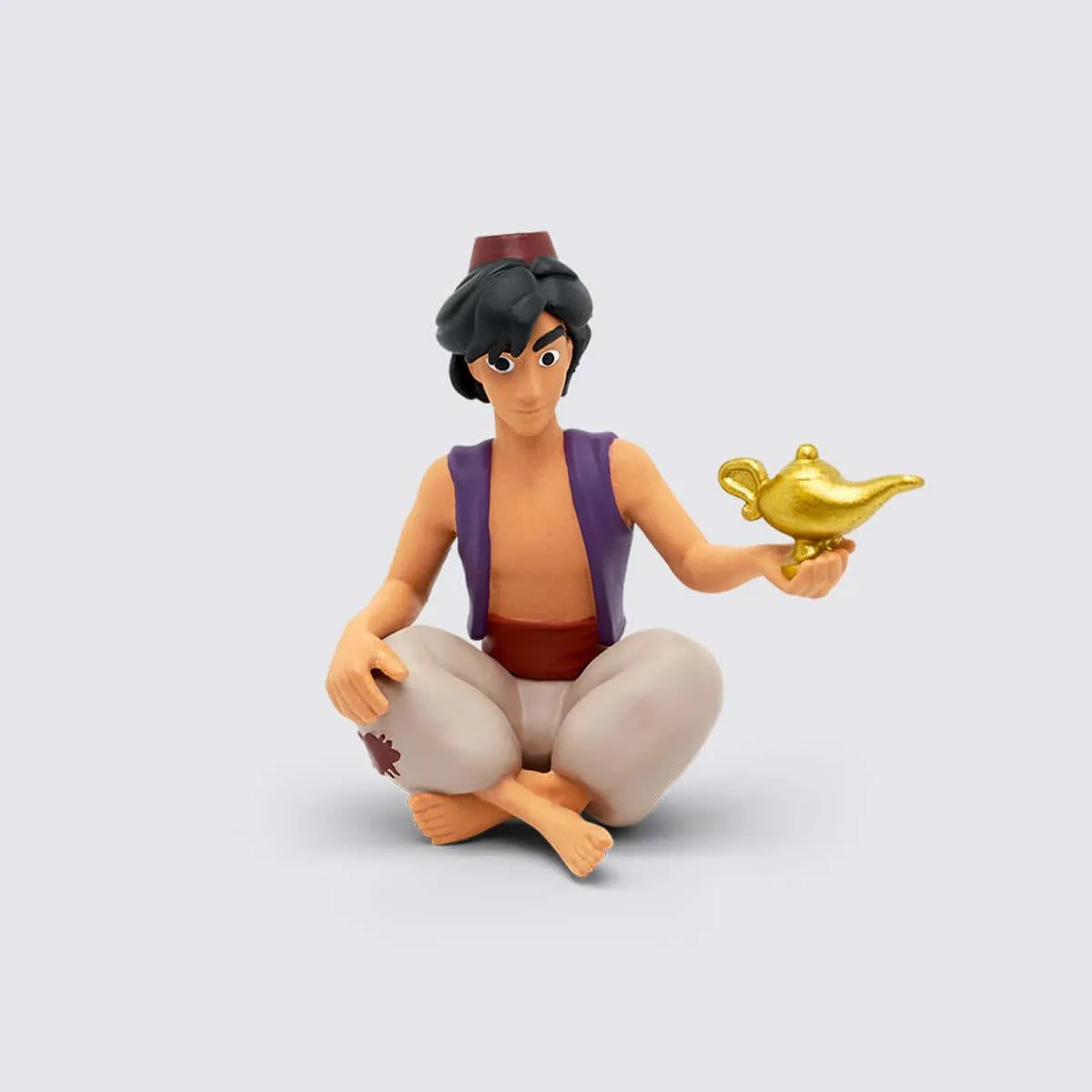 Aladdin Sitting with Legs Crossed in Simple White Background