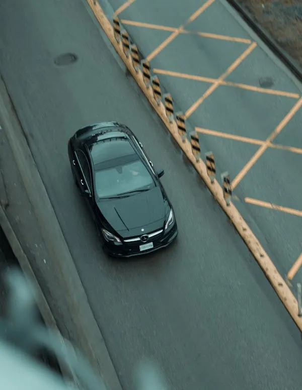 Aerial View of Mercedes Benz Car on Road Bridge Wallpaper