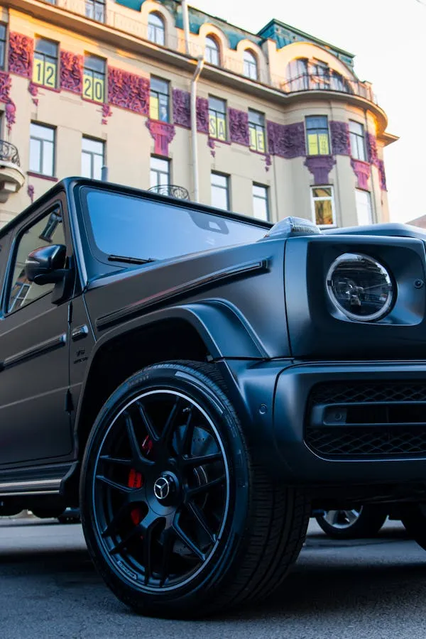 Aggressive stance of black Mercedes G Wagon in city