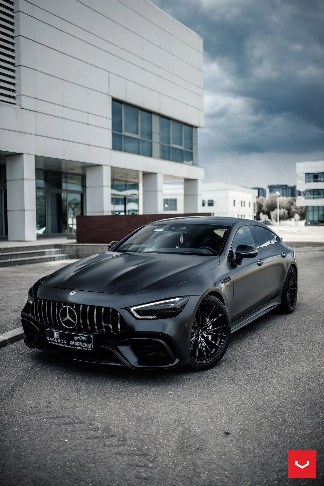 Amazing Black Mercedes AMG Parked Outside Modern Building
