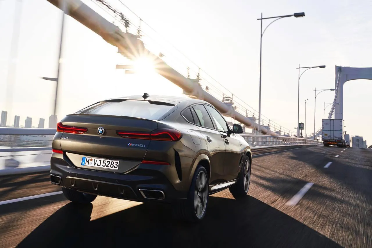 Amazing Bmw Coupe Driving on Bridge During Golden Hour