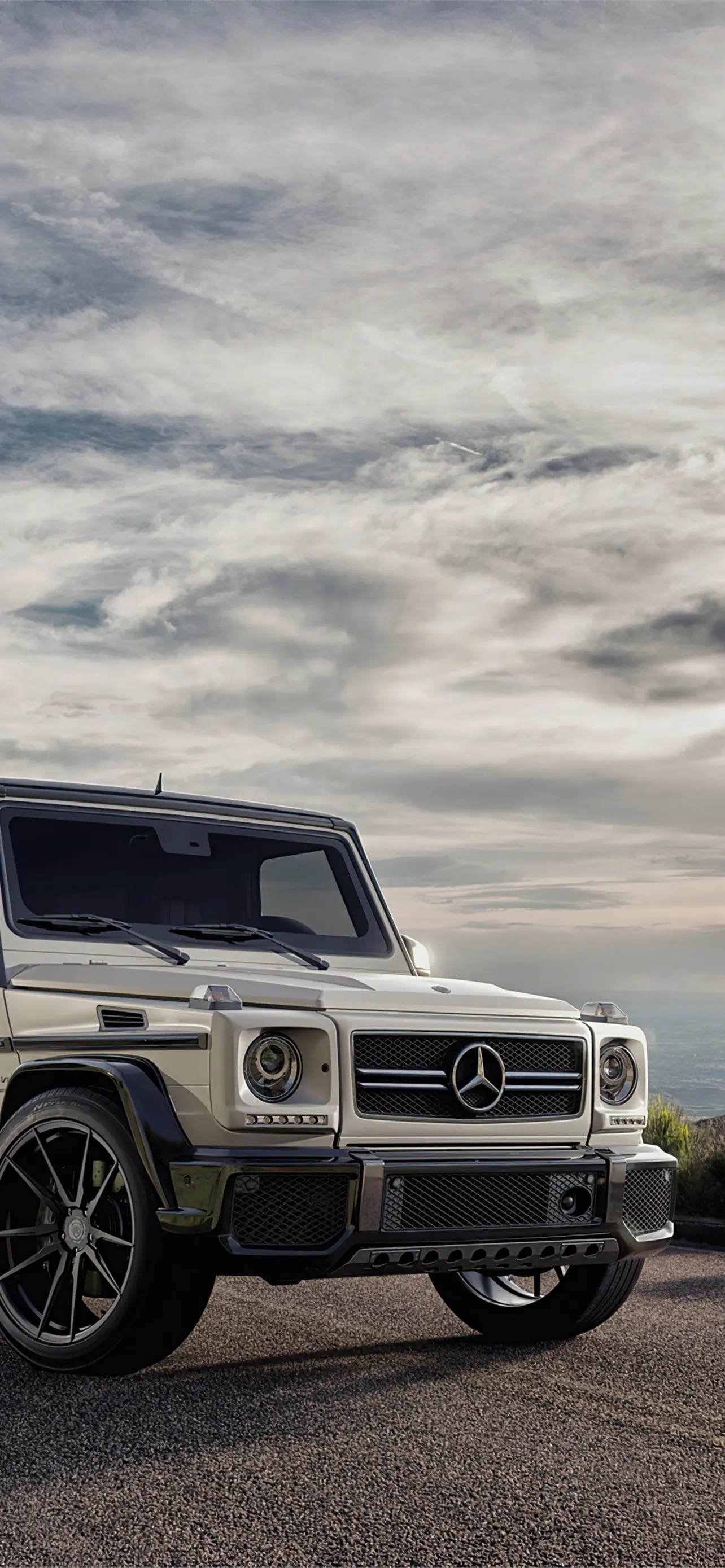 Amazing Mercedes G Class Driving Under Cloudy Open Sky