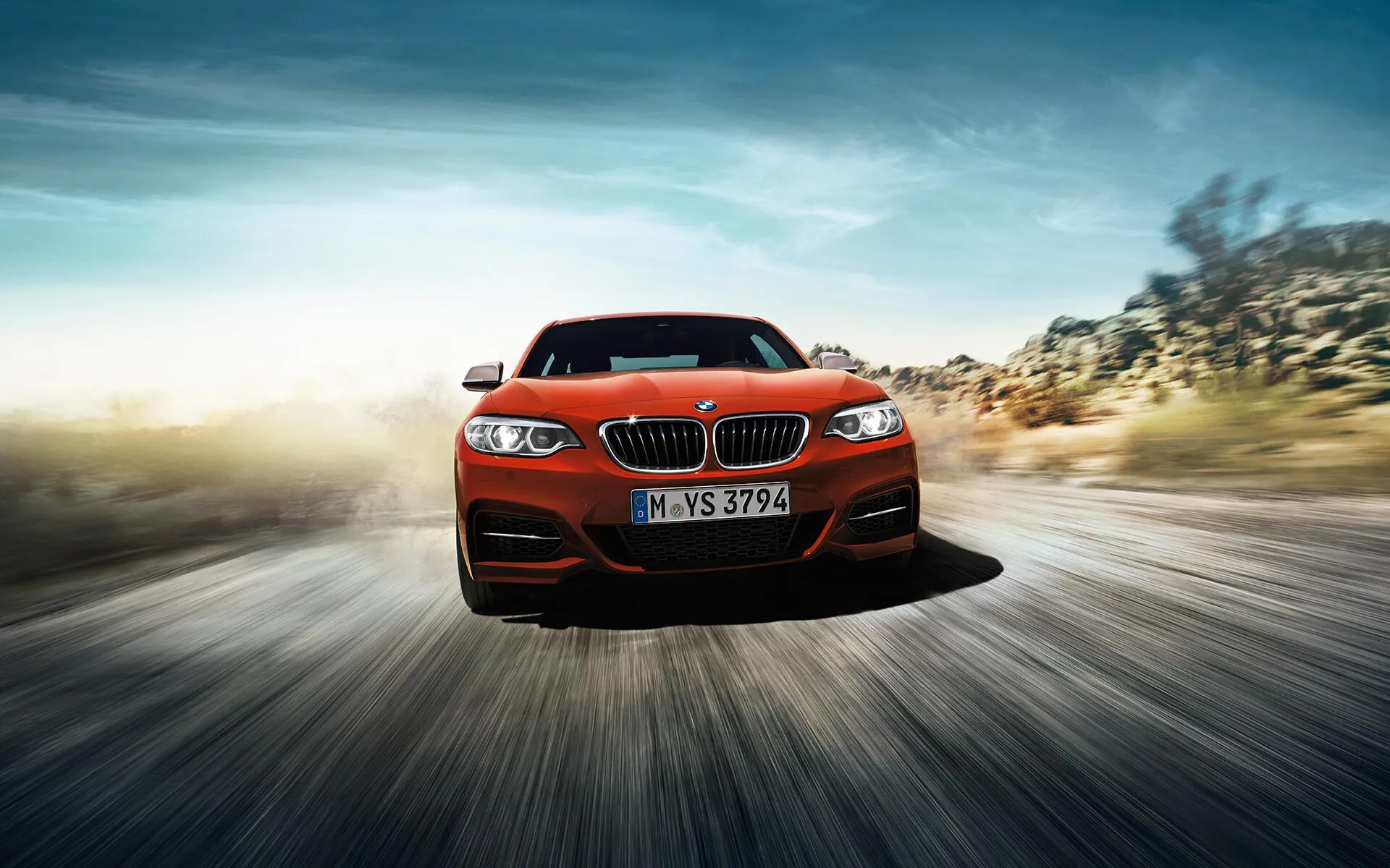 Amazing Red Bmw Speeding on an Open Road with Motion Blur