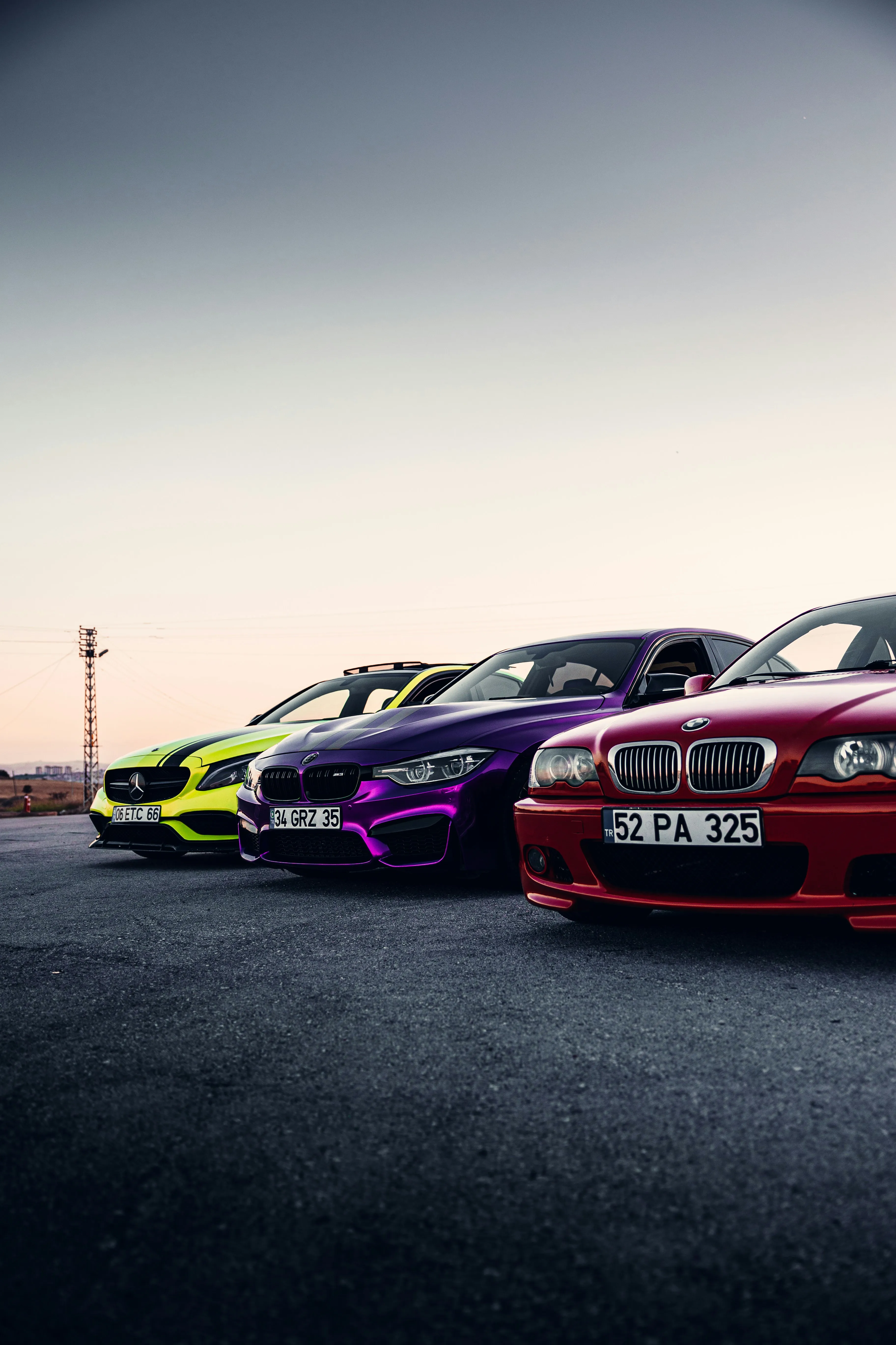 Amazing Row of colorful luxury cars parked in outdoor lot