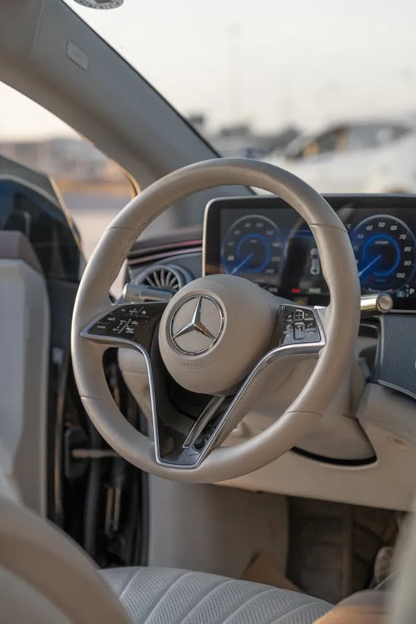 Beige Interior of Luxury Mercedes Benz Steering Wheel