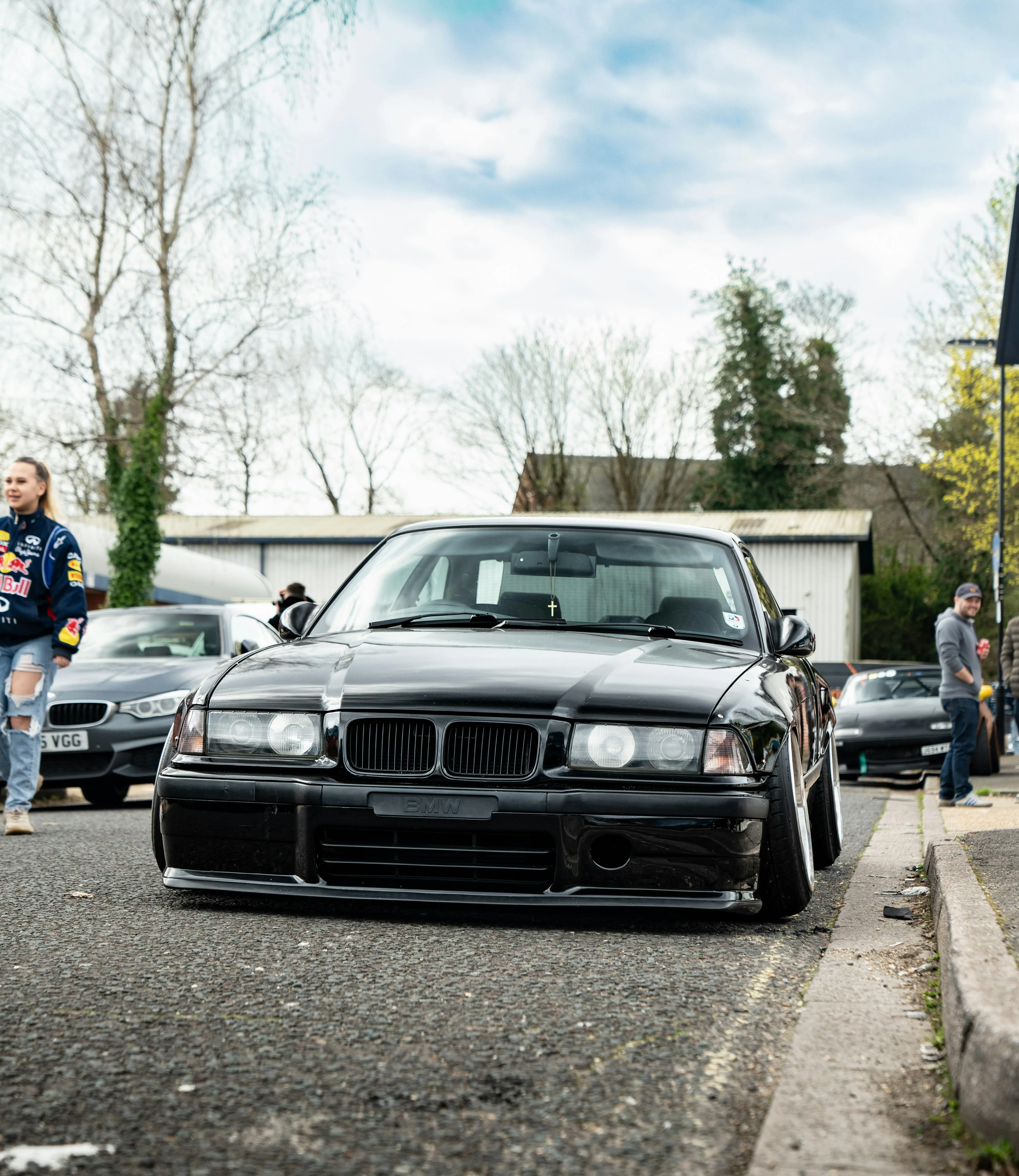 Black Bmw Car Parked at a Car Meet Event Outdoors Image
