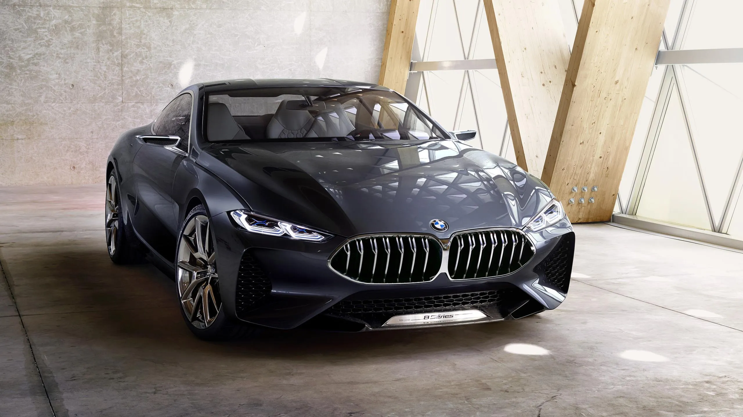 Black Bmw Convertible Parked Inside Building with Sunlight