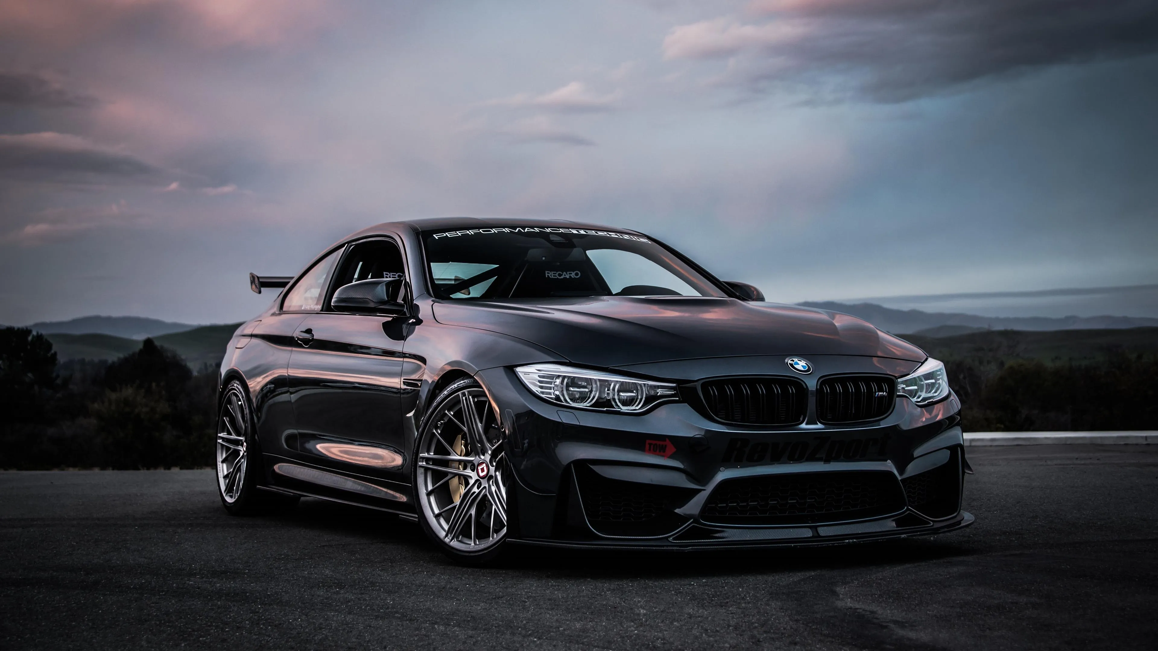 Black Bmw Coupe Parked with Cloudy Sky at Dusk Wallpaper