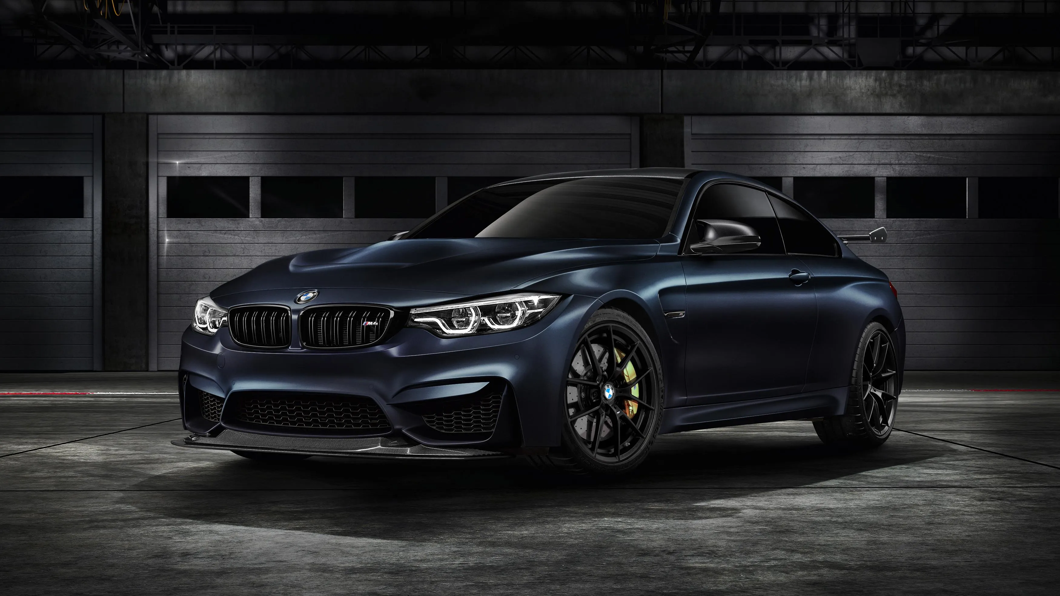 Black Bmw M4 Coupe Parked in a Dark Room with Lights