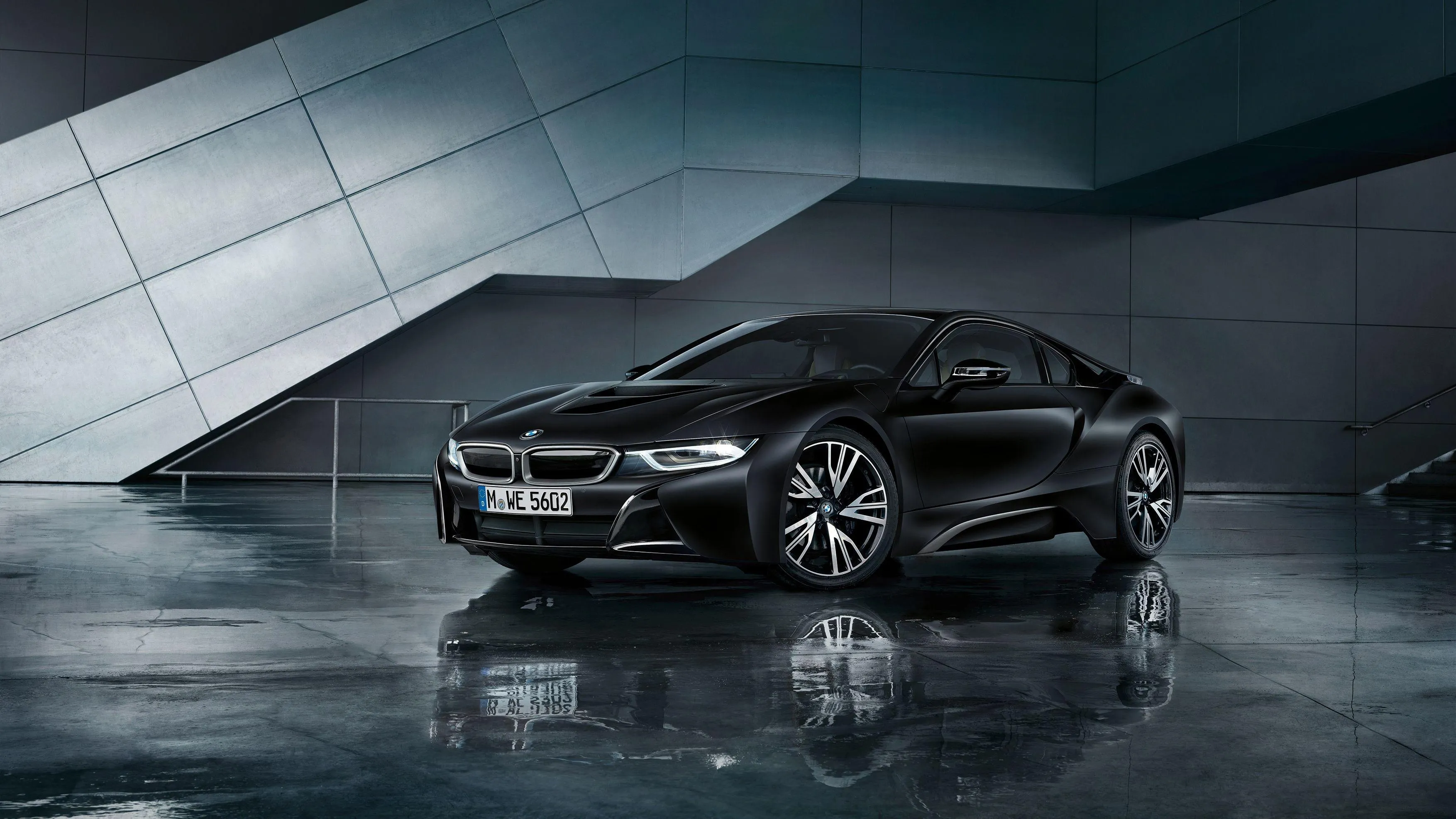 Black Bmw Sedan Displayed in a Futuristic Studio Setting