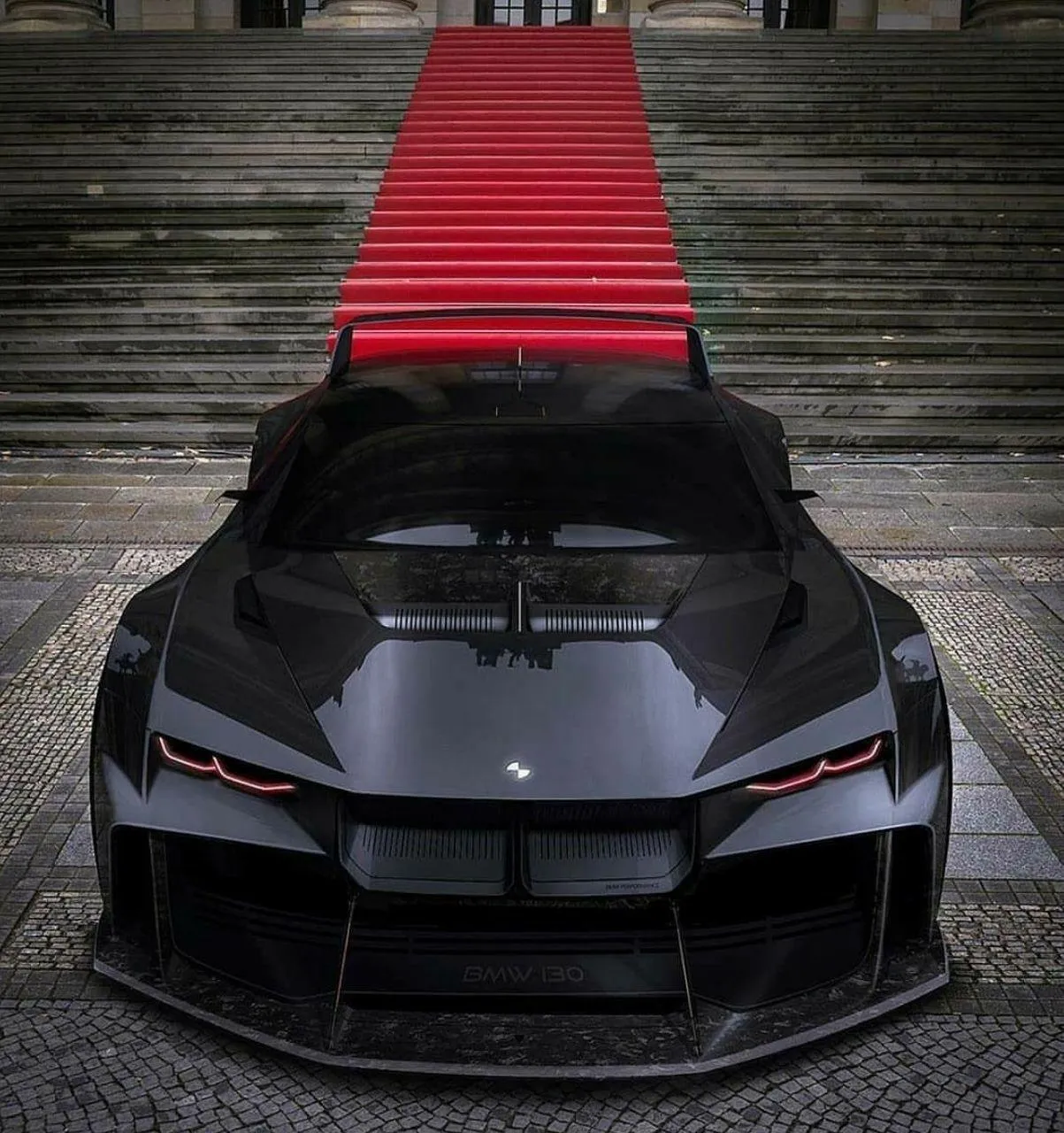 Black Bmw Sports Car Parked on Stairs with a Sleek Design