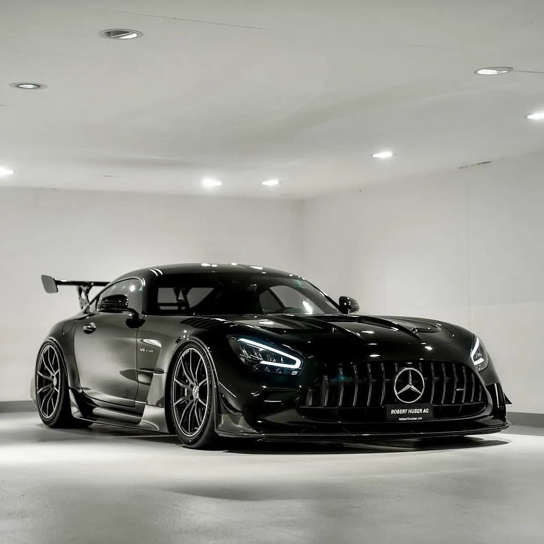 Black Mercedes AMG in White Minimalist Showroom Wallpaper