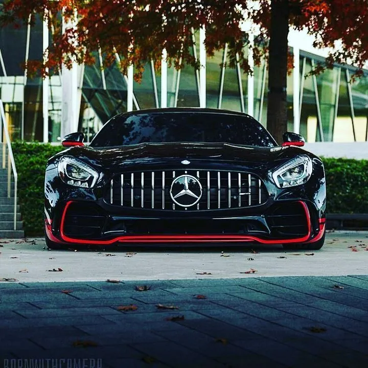Black Mercedes Benz AMG Front View with Urban Backdrop
