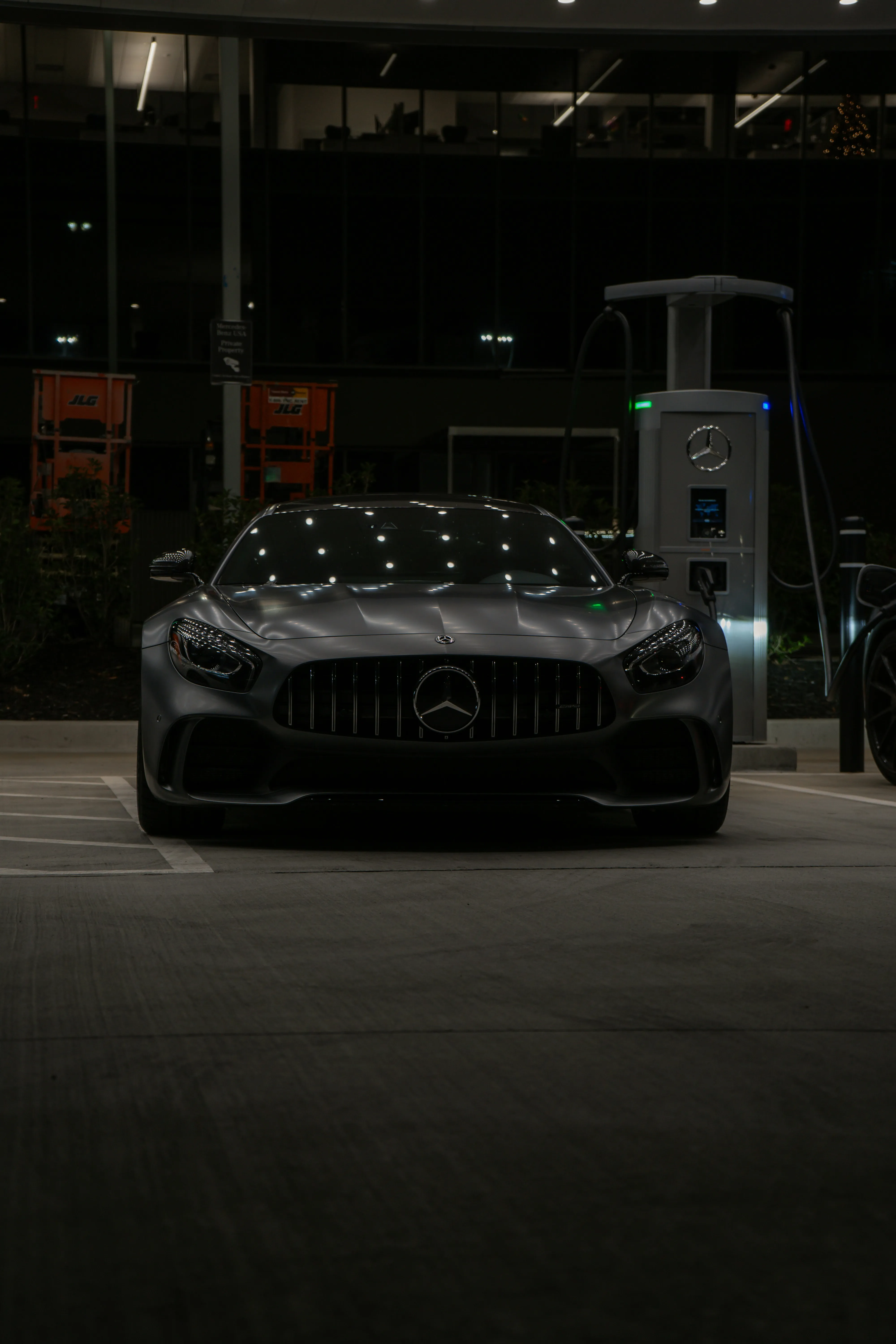 Black Mercedes Benz Car Parked in Dark Urban Setting