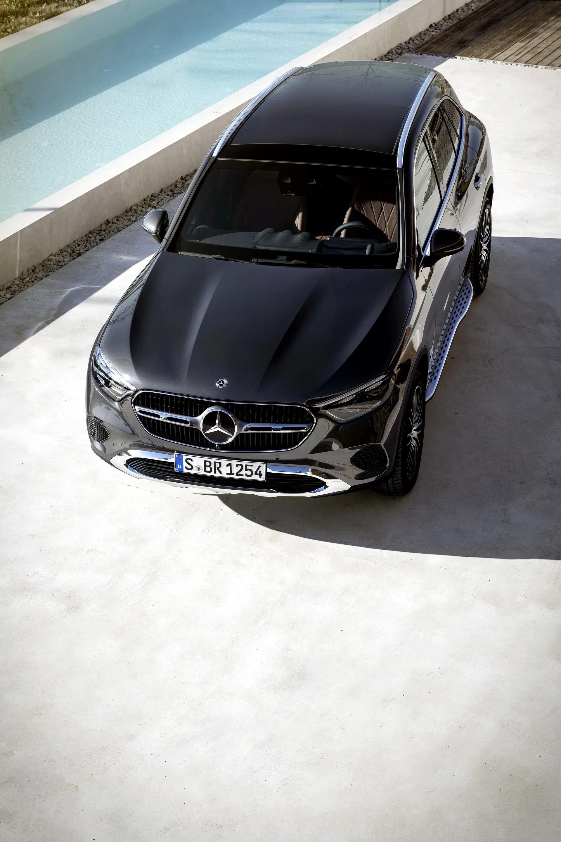 Black Mercedes Benz Car Parked Near Modern Pool image